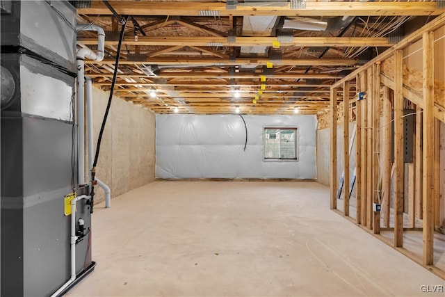 basement featuring heating unit