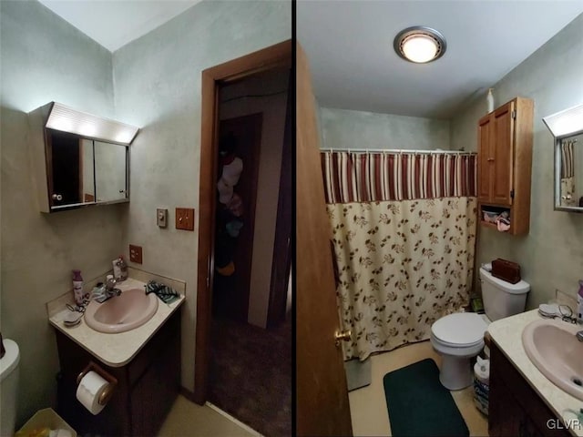 bathroom featuring curtained shower, vanity, and toilet