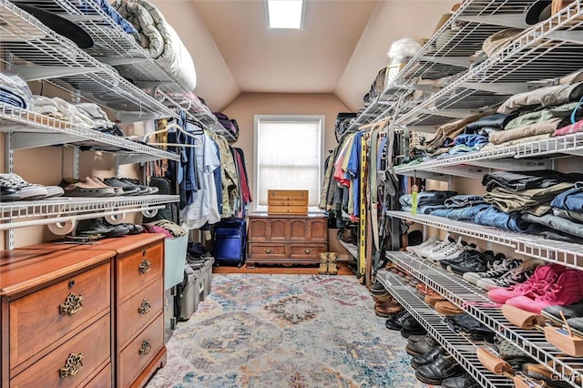 spacious closet featuring vaulted ceiling