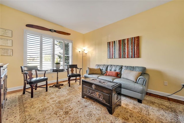 living room with light hardwood / wood-style flooring