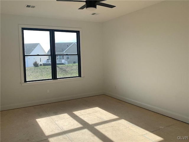 spare room featuring ceiling fan