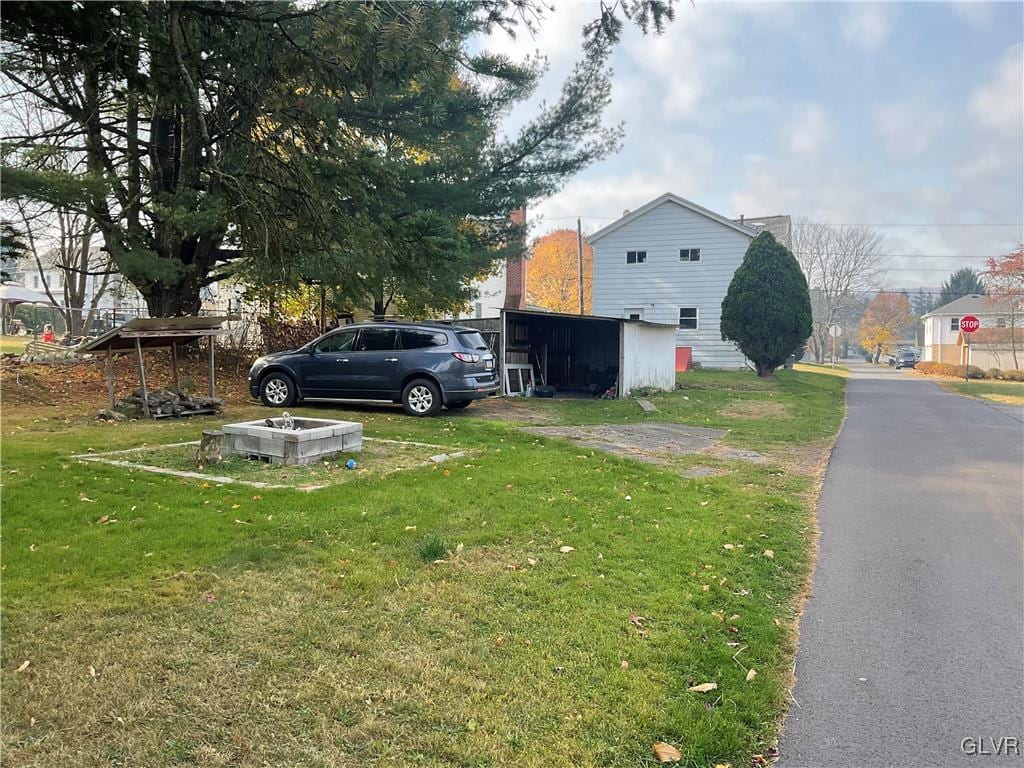 view of property exterior featuring a yard