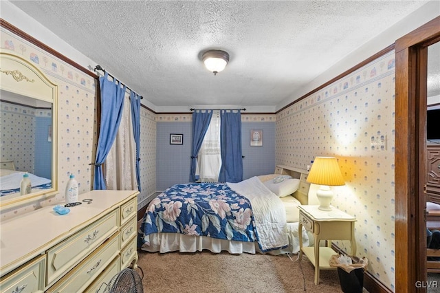 carpeted bedroom featuring a textured ceiling