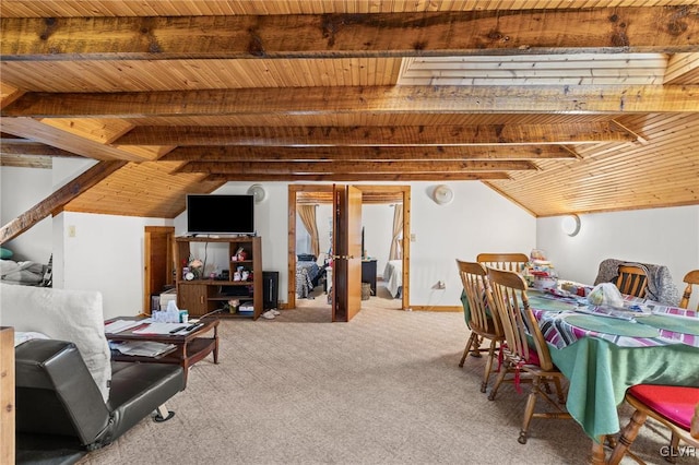 dining space with wood ceiling, lofted ceiling with beams, and carpet