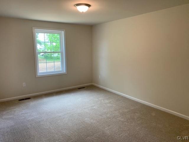 view of carpeted spare room