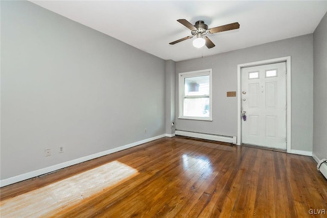 foyer with hardwood / wood-style floors, ceiling fan, and a baseboard radiator