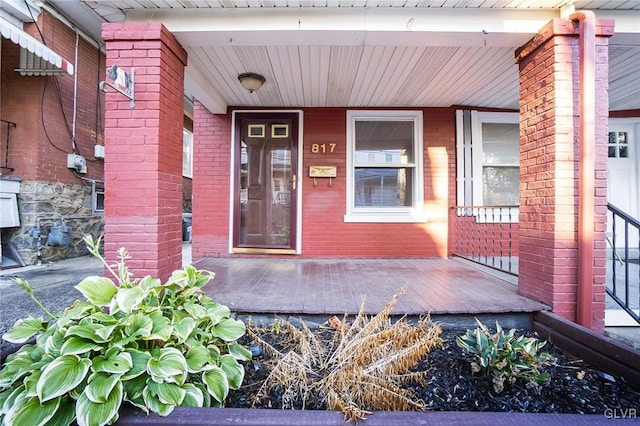 entrance to property with a porch