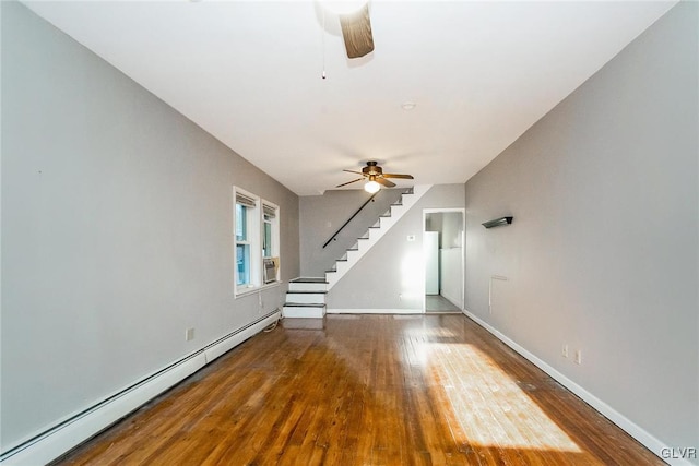 unfurnished living room with hardwood / wood-style floors, ceiling fan, and baseboard heating