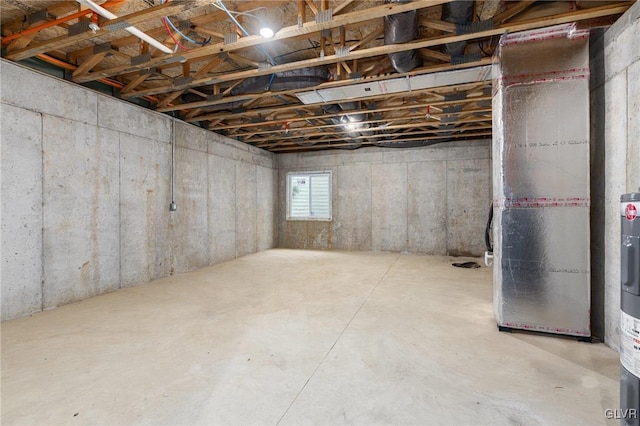 basement featuring heating unit