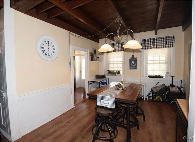 dining space with beamed ceiling, dark hardwood / wood-style flooring, and wood ceiling