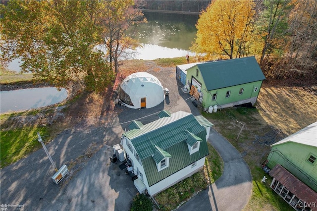 drone / aerial view featuring a water view