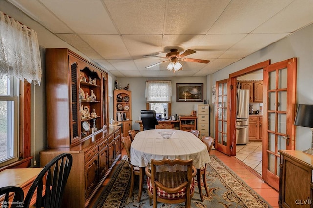 3479 Mango Dr, Lehigh Township, PA 18038 - dining room featuring a paneled ceiling, a ceiling fan, light tile patterned floors, and an office area