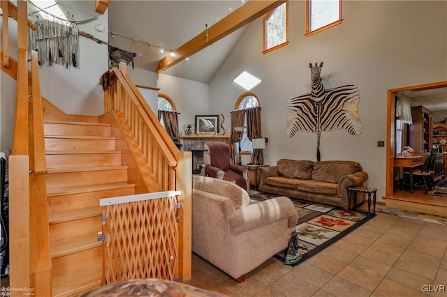 3479 Mango Dr, Lehigh Township, PA 18038 - living room featuring high vaulted ceiling and stairway
