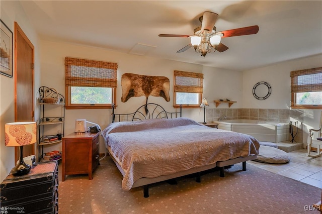 bedroom featuring ceiling fan and light tile patterned floors