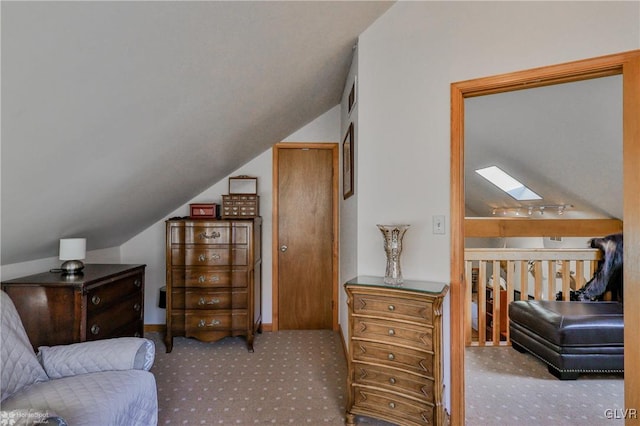 living area featuring lofted ceiling with skylight and light carpet