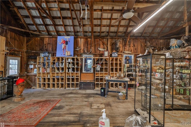 3479 Mango Dr, Lehigh Township, PA 18038 - misc room featuring ceiling fan, vaulted ceiling, wood walls, and wood-type flooring