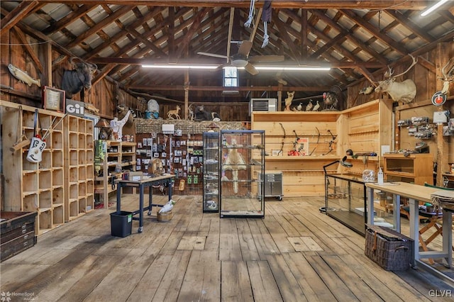 interior space with ceiling fan