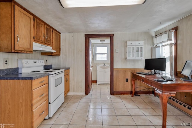 3479 Mango Dr, Lehigh Township, PA 18038 - kitchen with electric stove, under cabinet range hood, an office area, light tile patterned flooring, and a sink