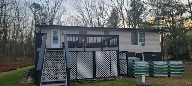 view of front facade with a wooden deck