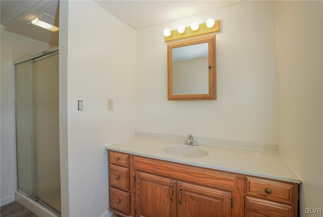 bathroom featuring vanity and walk in shower