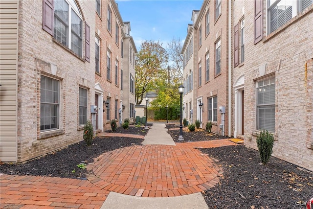 surrounding community with a patio area