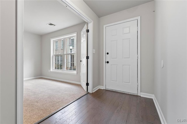 entrance foyer with dark wood-type flooring