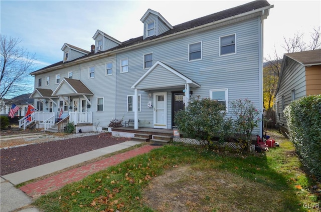 view of front of home featuring covered porch