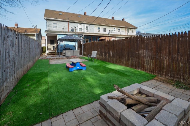 view of yard featuring a gazebo and a patio area