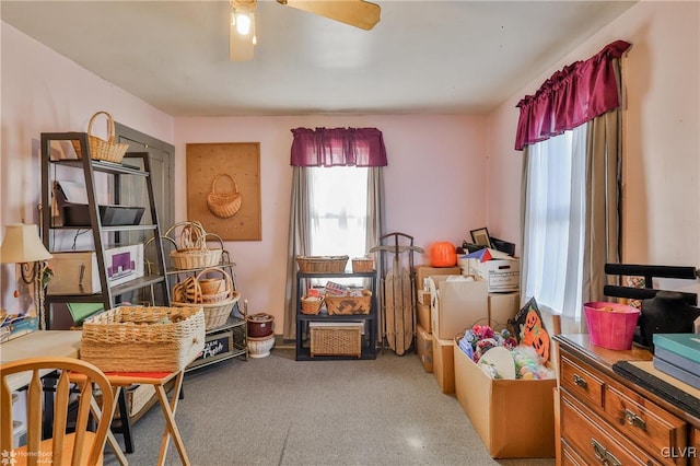 interior space featuring ceiling fan