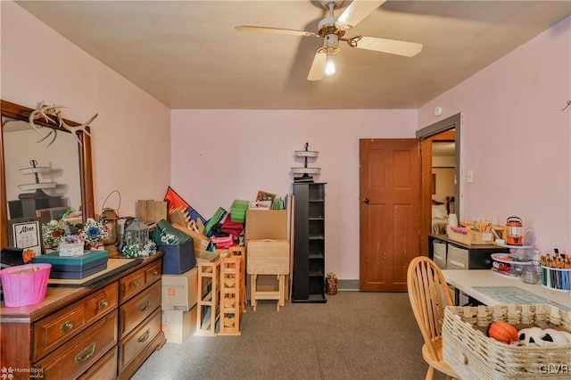 interior space with ceiling fan