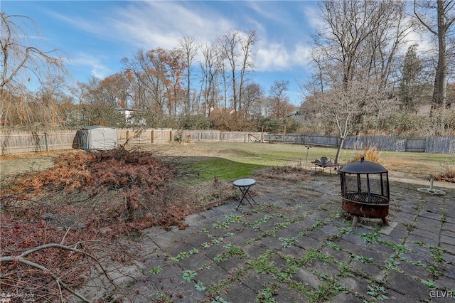 view of patio / terrace featuring a fire pit