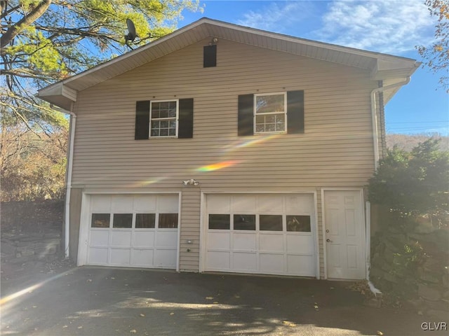 exterior space featuring a garage