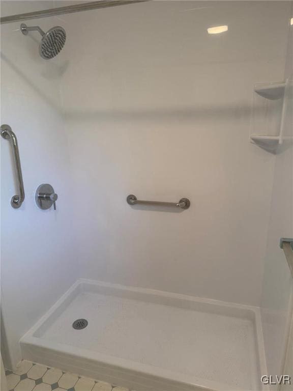 bathroom featuring walk in shower