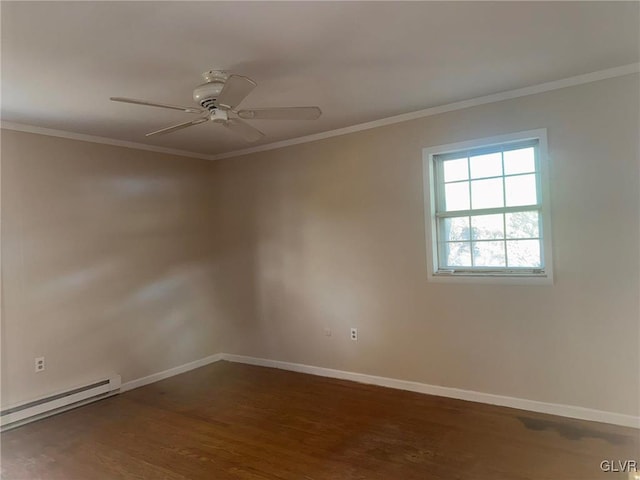 spare room featuring ceiling fan, crown molding, dark hardwood / wood-style floors, and a baseboard heating unit