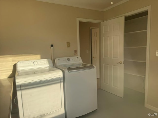 washroom with washer and dryer