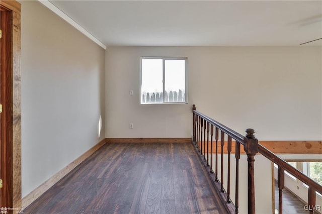 spare room with dark hardwood / wood-style flooring