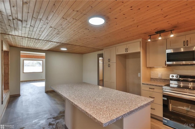 kitchen with backsplash, wooden ceiling, white cabinets, and stainless steel appliances