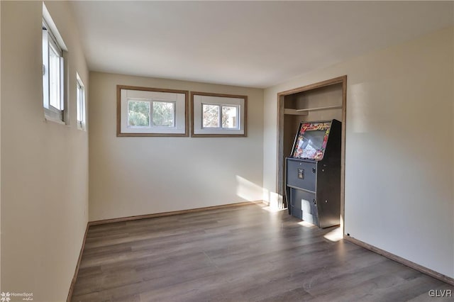 empty room featuring wood-type flooring