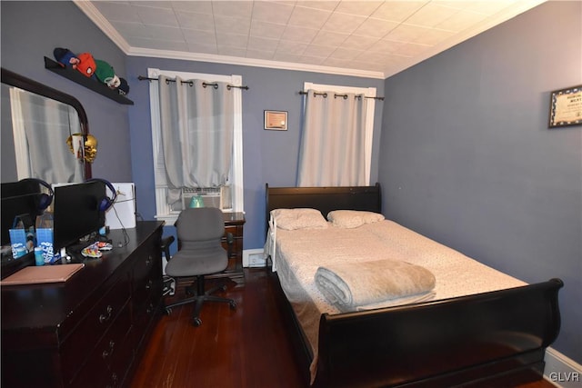 bedroom with crown molding, cooling unit, and dark hardwood / wood-style floors