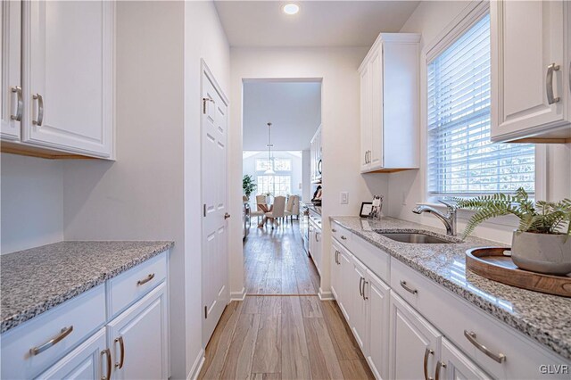 3855 Victors Way, Bethlehem Twp, PA 18045 - kitchen with white cabinets, light hardwood / wood-style floors, and a wealth of natural light