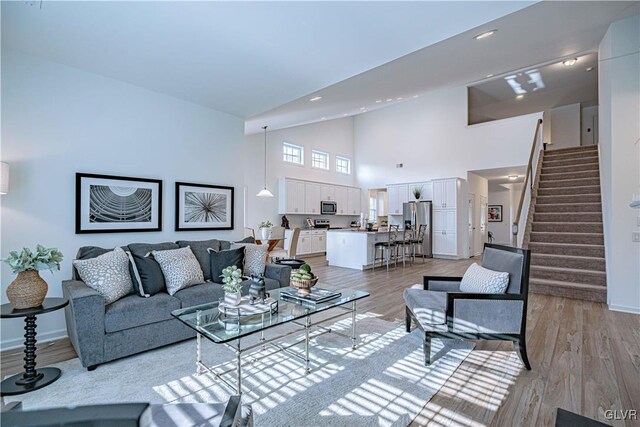 3855 Victors Way, Bethlehem Twp, PA 18045 - living room with light hardwood / wood-style floors and high vaulted ceiling