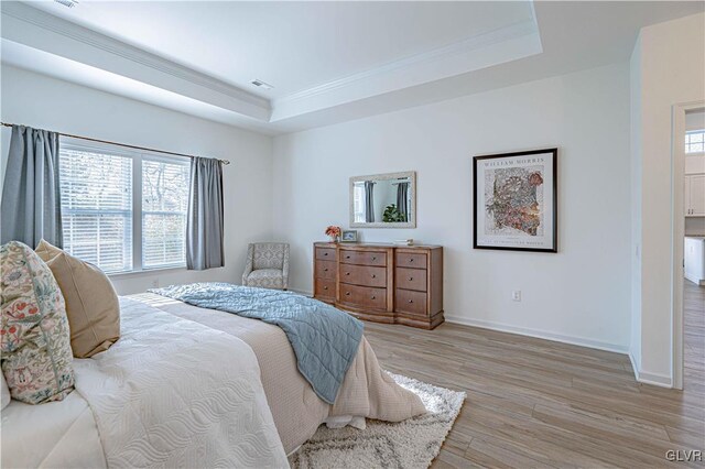 3855 Victors Way, Bethlehem Twp, PA 18045 - bedroom with light wood-type flooring, ornamental molding, and a tray ceiling