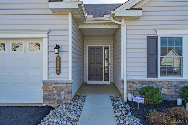 property entrance featuring a garage