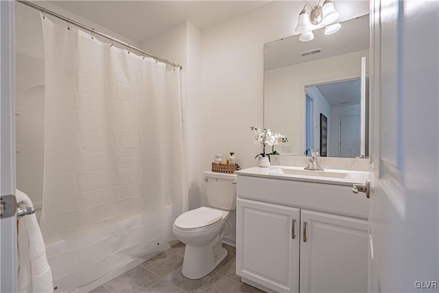 bathroom with vanity, an inviting chandelier, tile patterned floors, toilet, and walk in shower