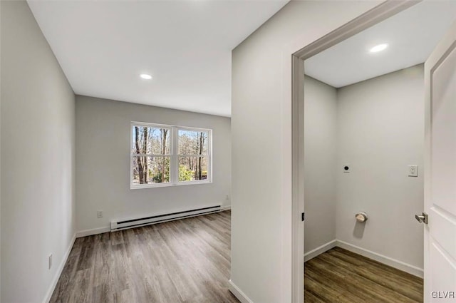 hall featuring dark hardwood / wood-style flooring and a baseboard radiator