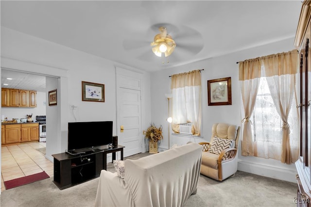 carpeted living room with cooling unit and ceiling fan