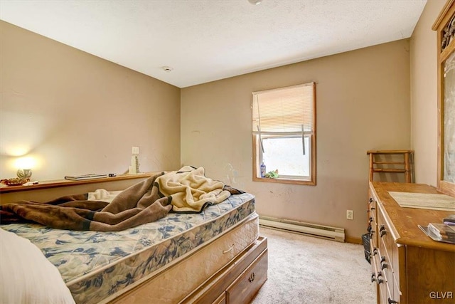 bedroom featuring a textured ceiling, a baseboard radiator, and light colored carpet