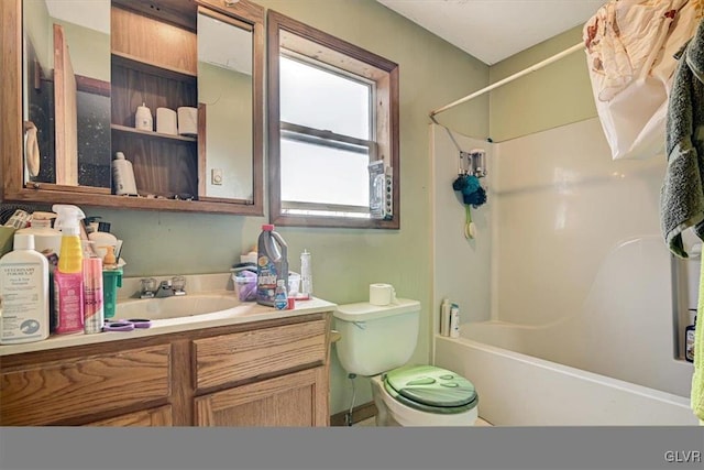 full bathroom with shower / tub combination, vanity, and toilet