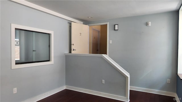 empty room featuring dark hardwood / wood-style floors