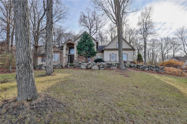 view of front of property with a front lawn